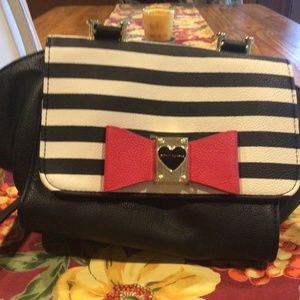 Betsy Johnson Black and stripe with red bow tie on front shoulder purse
